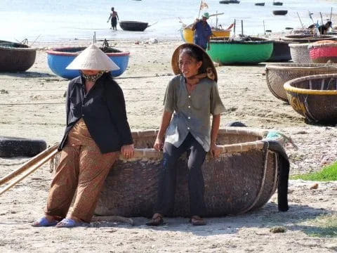two grannies chatting port mui ne - vietnam