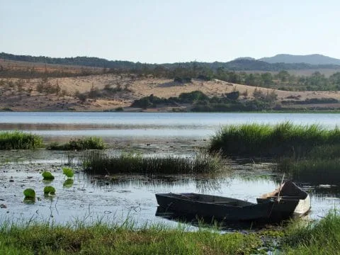 lake in front of white dunes mui ne