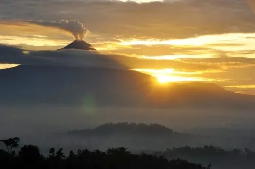 Memorable sunrise over Borobudur with view of Merapi