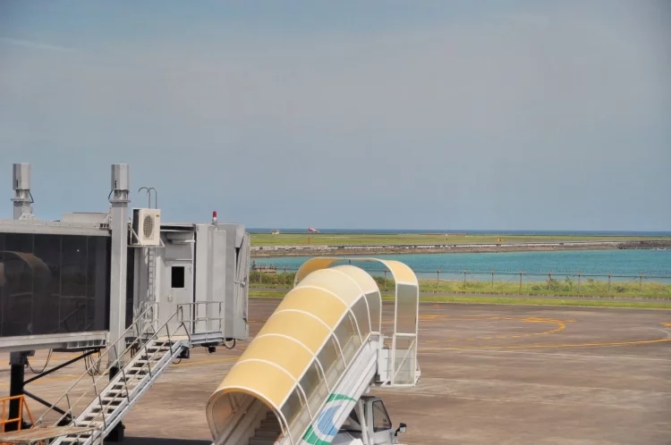 on tarmac bali airport - return thailand