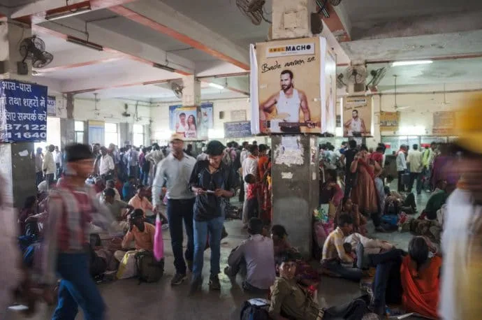in the crowded hall of varanasi railway station - india