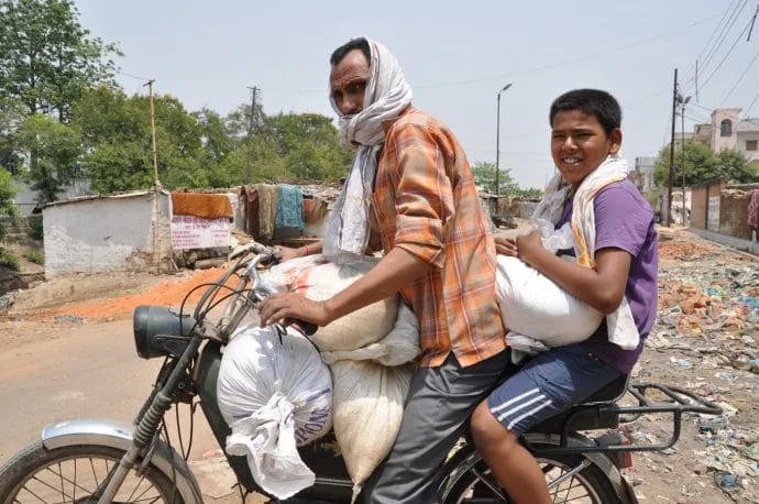 loaded motorbike in varanasi - india