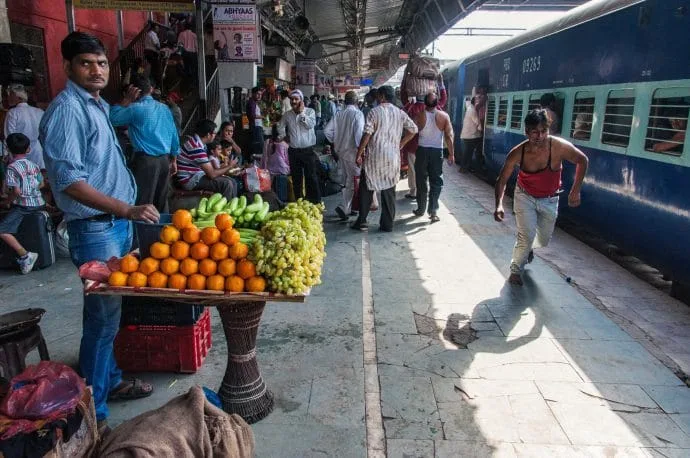 fruit seller varanasi station - india