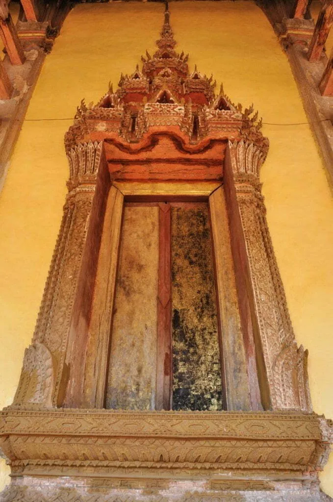 Detail of the carved window of Wat Sisaket Vientiane Laos