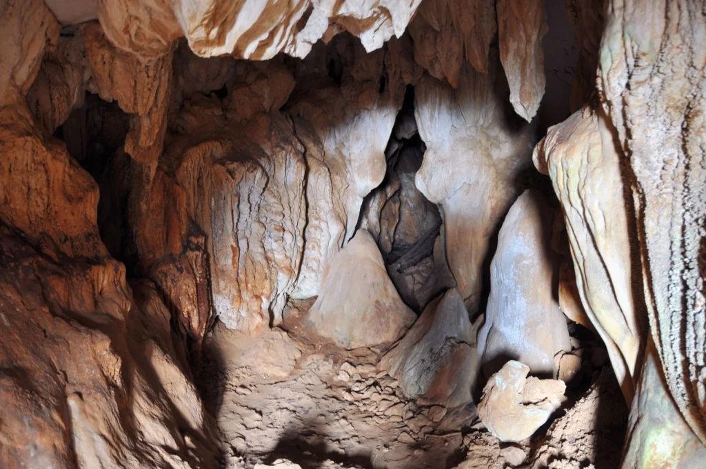 interior of a small cave in vang vieng