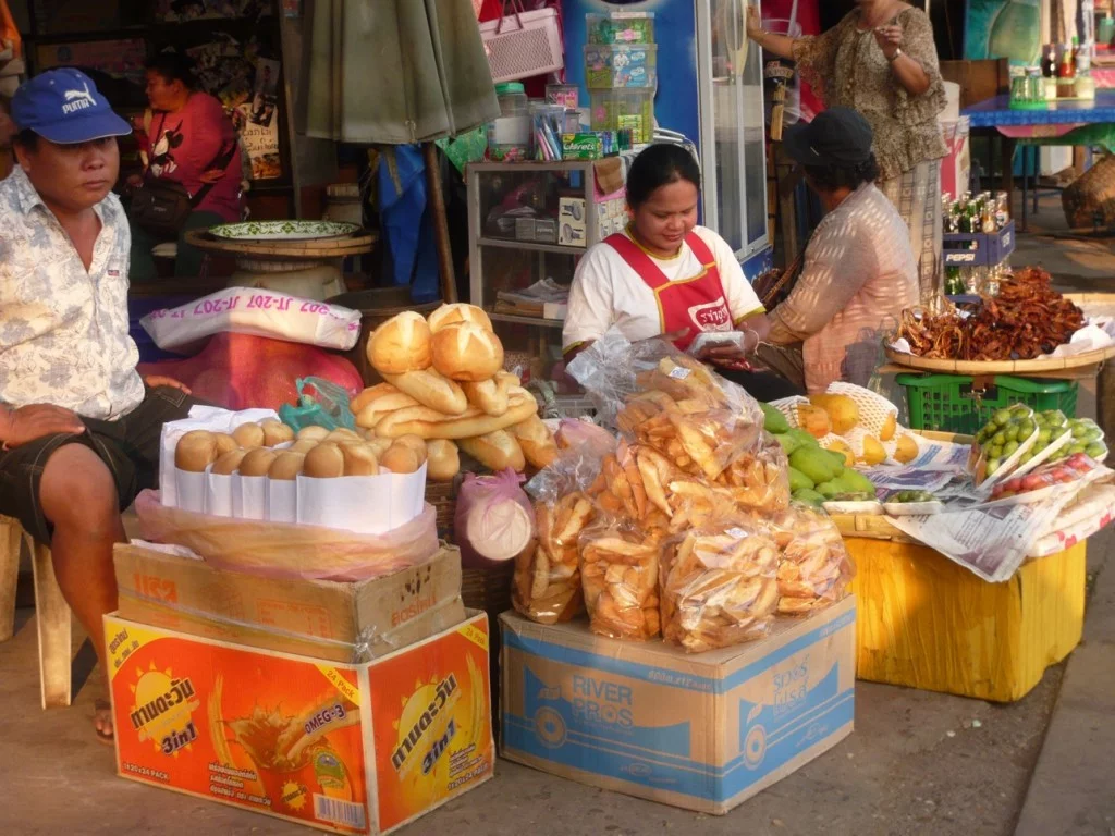 Saleswomen at the bus station in Vientiane Laos