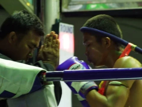 Prayer before Thai boxing match