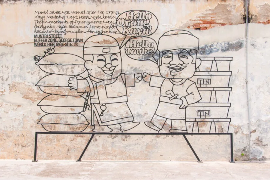 win win lefty sculpture marking george town penang