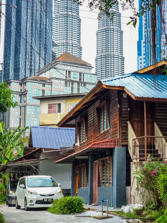 wooden house with petronas towers kampung baru district kuala lumpur