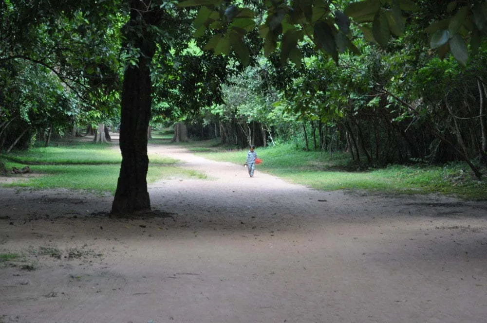 1 dollar kid at the temples of Angkor Cambodia