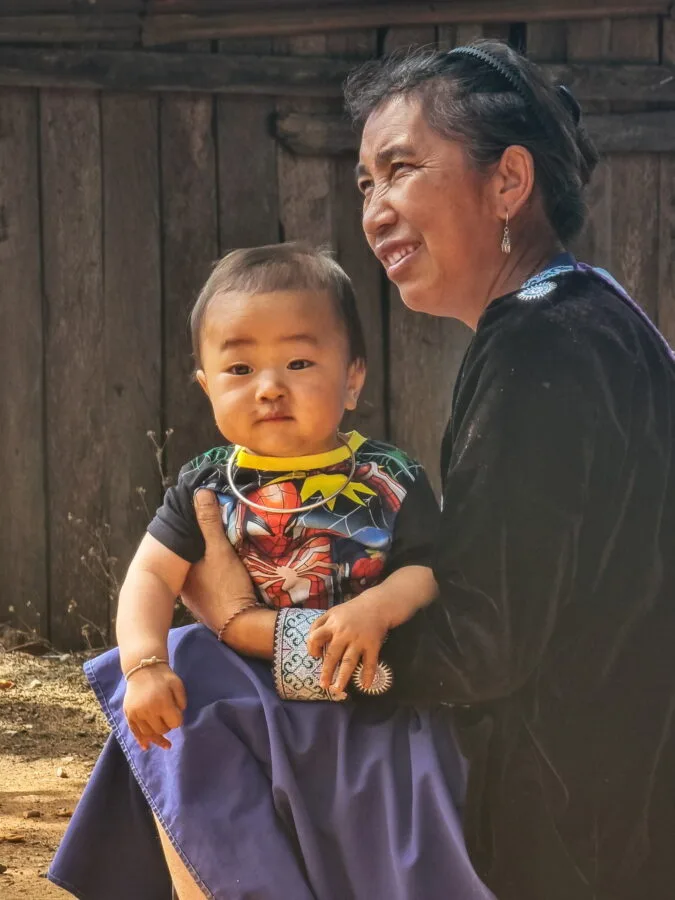 portrait of a child grandmother in the Hmong village of Khun Chang Khian Doi Pui