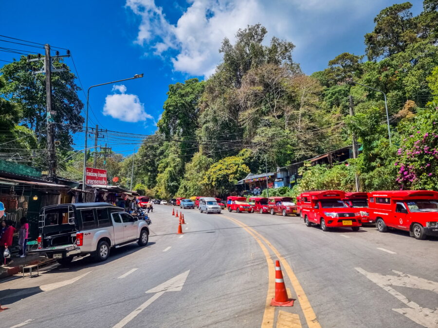 red songthaew at the foot of Wat Phra That Doi Suthep