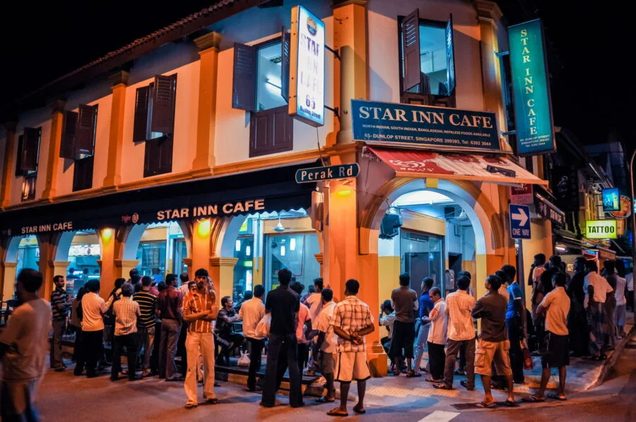 cricket match in progress little india district singapore
