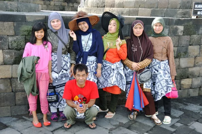 large family temple market Borobudur Java Island Indonesia