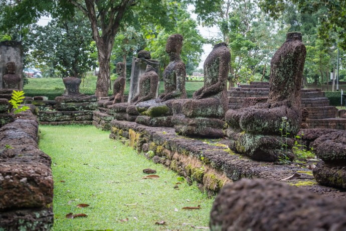 alignment of Buddhas in Kamphaeng Phet Historical Park