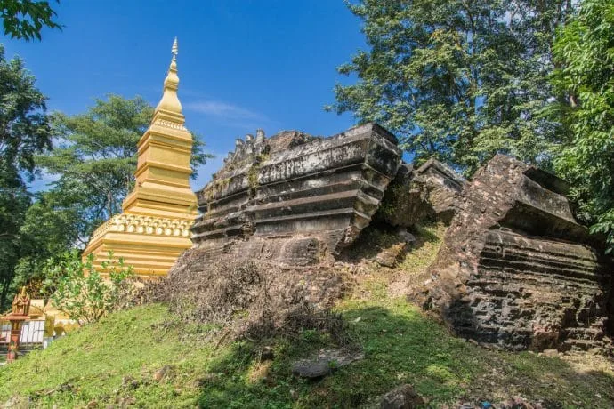old and new chedi Poumpouk Stupa temple Luang Namtha - Laos