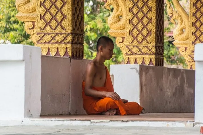 monk meditating Wat Hosian Voravihane luang prabang