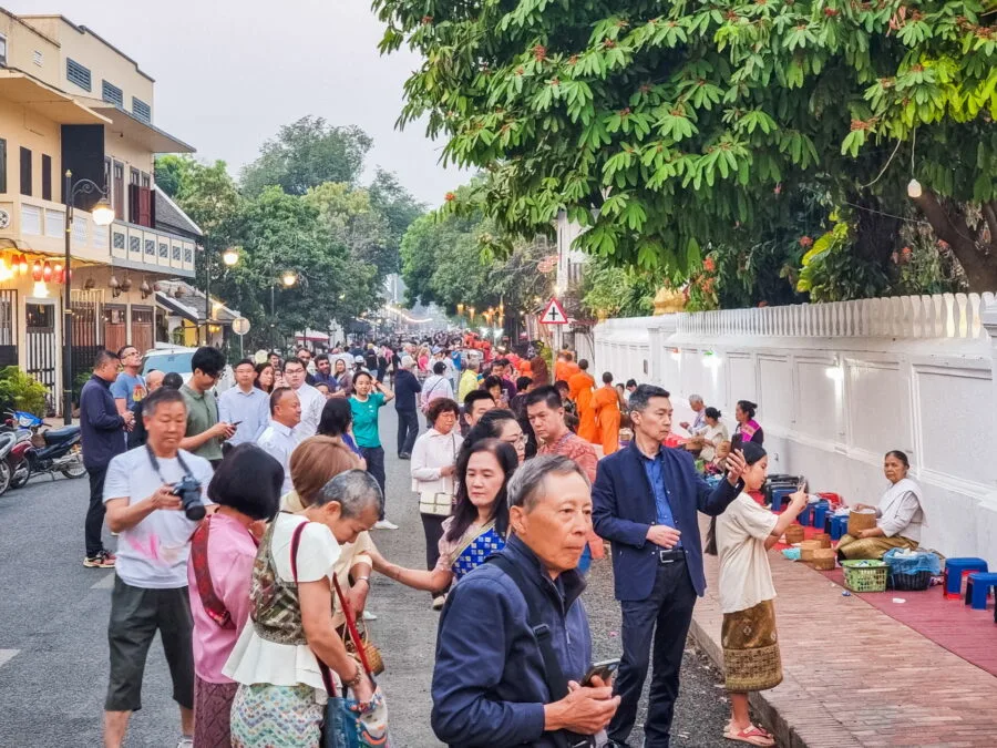 crowd ceremony tak bat luang prabang