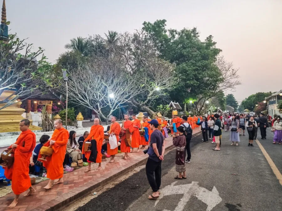 monks ceremony tak bat luang prabang