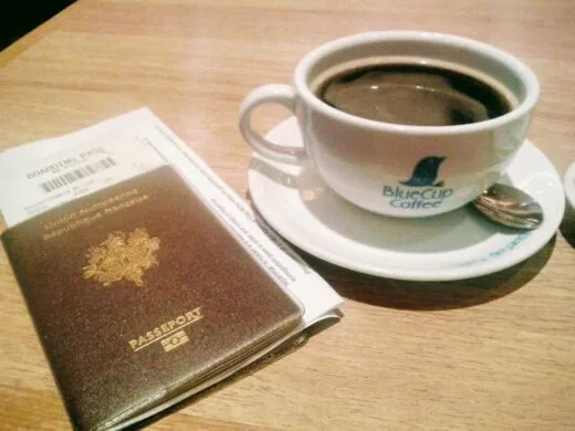 ready for take off passport and coffee