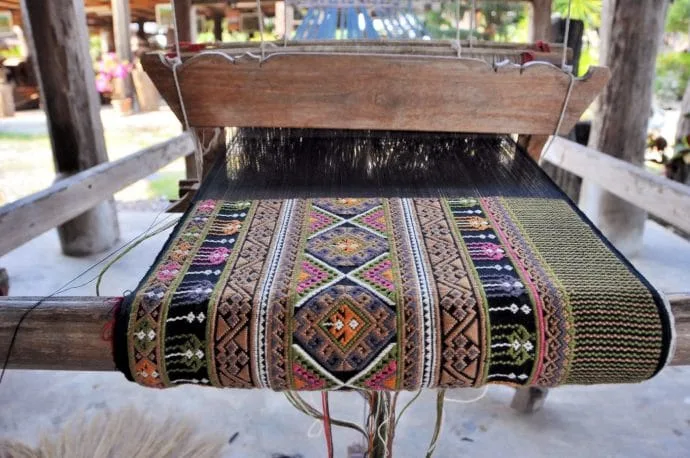 gold textile museum weaving machine - si satchanalai - thailand