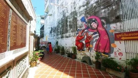 wall painting shrine serene light phuket town