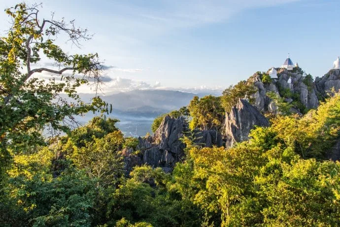 view of the valley behind and chedi wat chalerm phrakiat