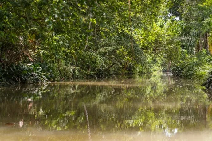 river at the foot of the cave khao kob trang