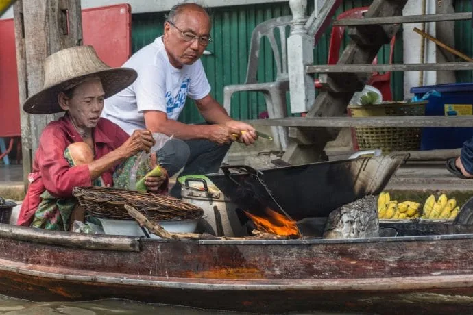 old lady floating market damnoen saduak