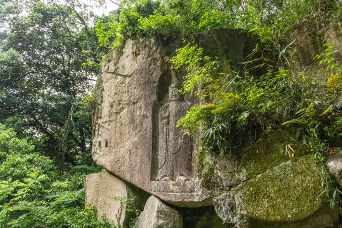 bike ride buddha sculpture rock wazuka - kyoto prefecture japan