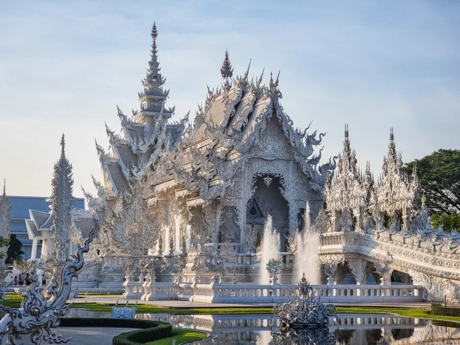 ubosot white temple wat rong khun late afternoon chiang rai