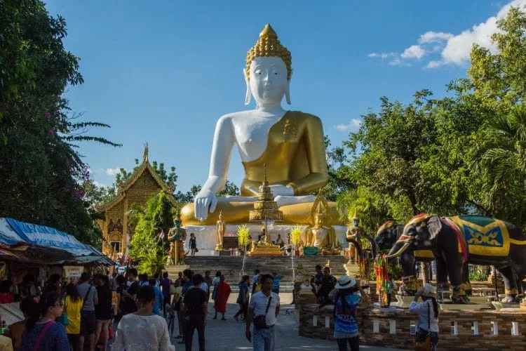 large buddha 17m wat phra that doi kham - chiang mai