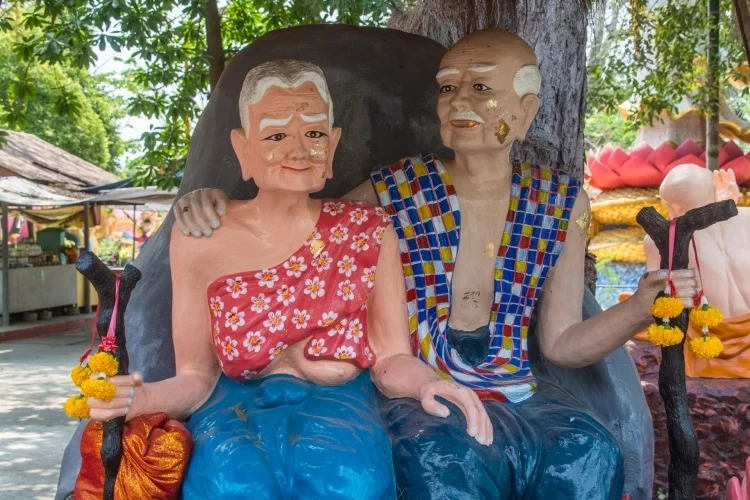 wat muang couple - ang thong - thailand