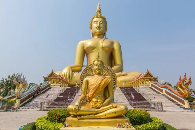 small and big buddha wat muang - ang thong - thailand