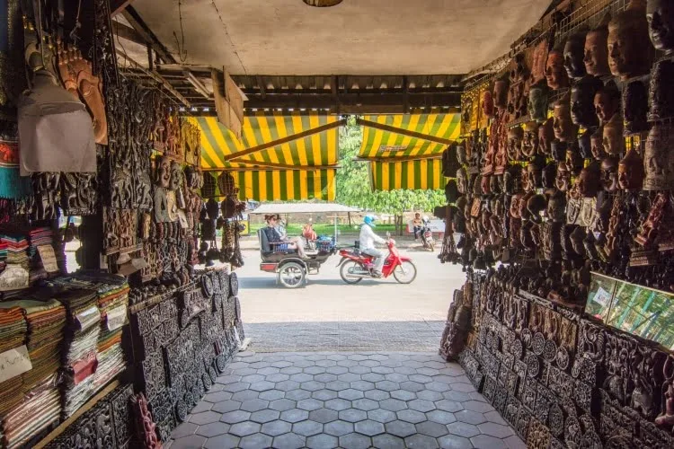 tuk-tuk passing by Siem Reap market - Cambodia
