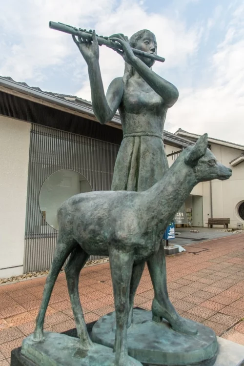girl and deer flute nara street - japan