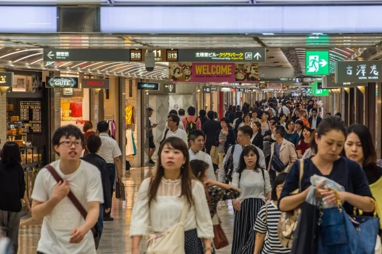 crowd metro osaka japan