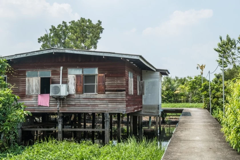 wooden house on stilts in ko kret