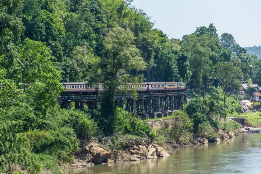 train arriving at wang pho viaduct kanchanaburi