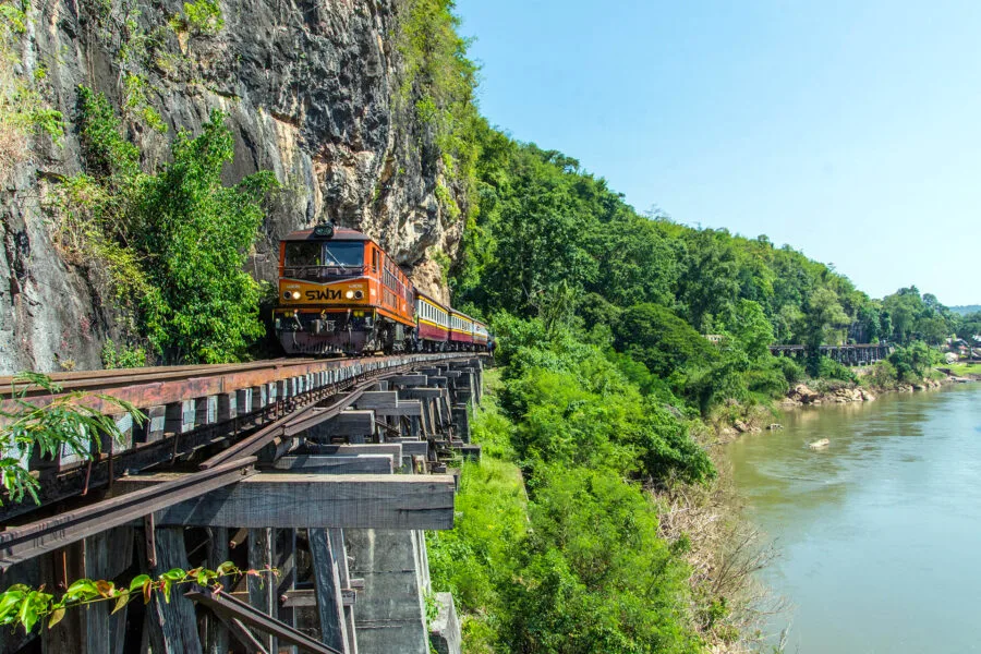 train passing on wang pho viaduct kanchanaburi thailand