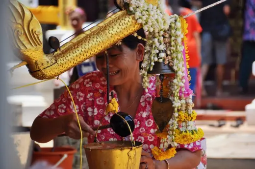 filling holy water wat phra that lampang luang