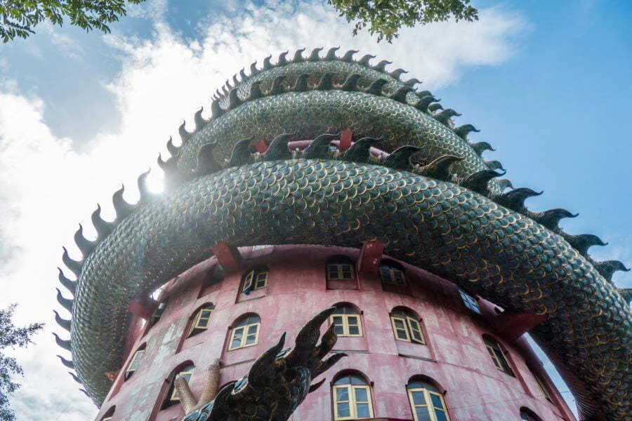 dragon surrounding dragon tower Wat Samphran