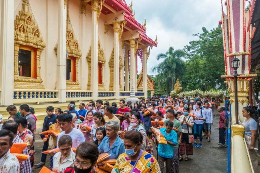lay people around temple ceremony kathina kanchanaburi