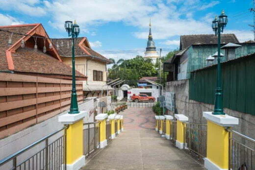 crossing the bridge to wat ket karam chiang mai