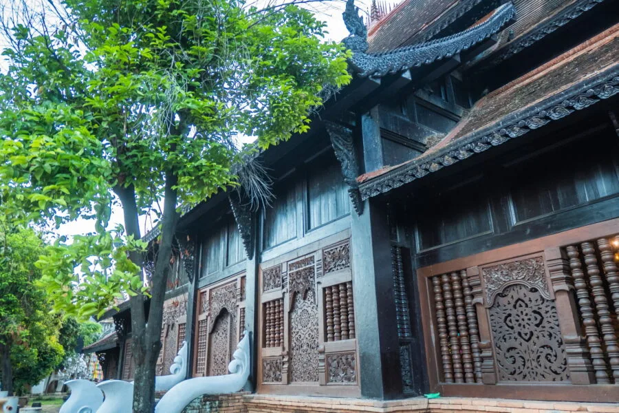 wooden facade wat lok mali - chiang mai