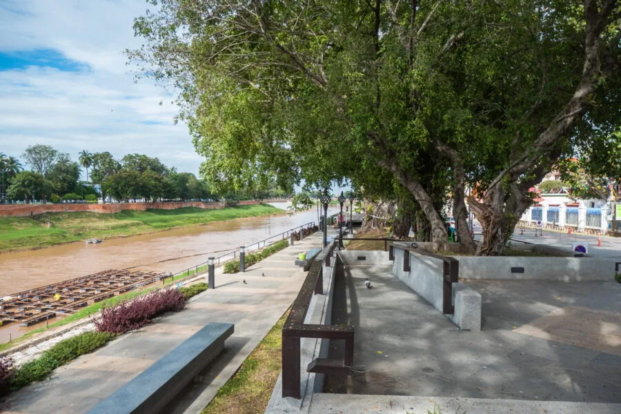 nan river in front of wat phra sri rattana mahathat - phitsanulok