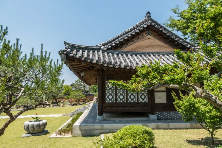 house surrounded by garden hahoe