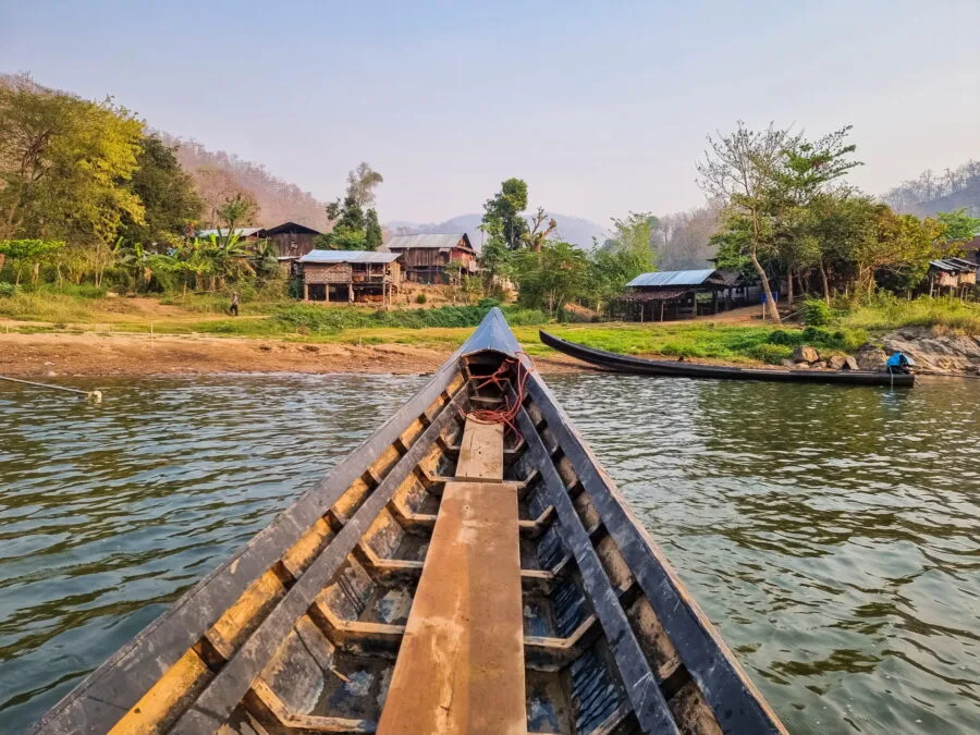 boat crossing to reach the village of huay pu keng