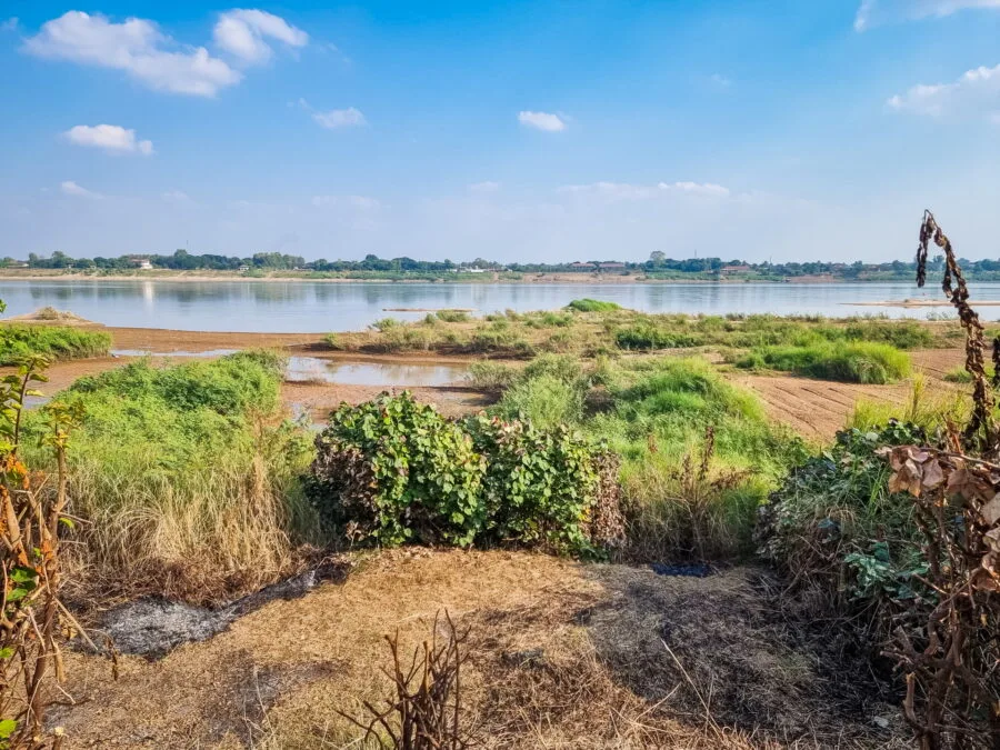 mekong river bank behind buddha park vientiane
