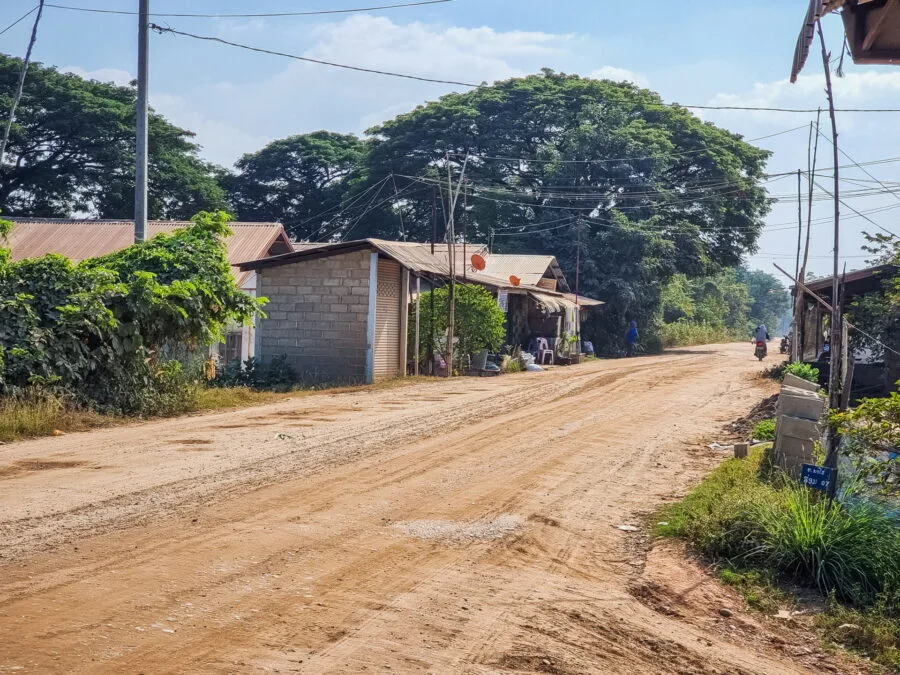 in front of small garage near Vientiane